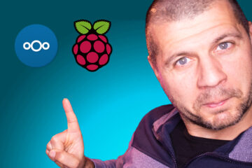 Me pointing at the Nextcloud on Raspberry Pi label