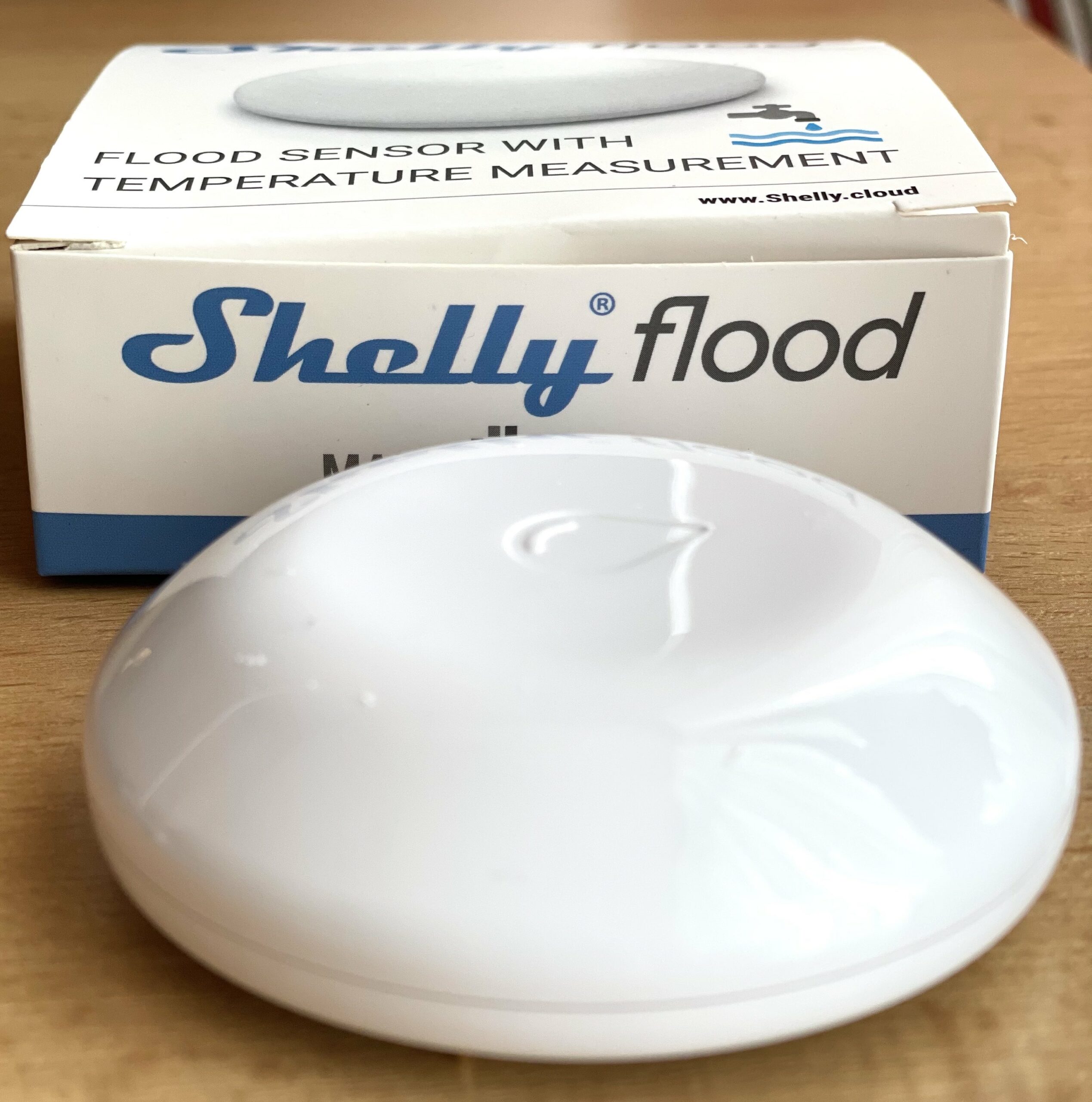 Shelly Flood Sensor that soon will be integrated with Home Assistant.