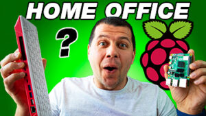 Kiril Peyanski Holding Raspberry Pi 4 and Raspberry Pi 400 with Home Office with question mark label