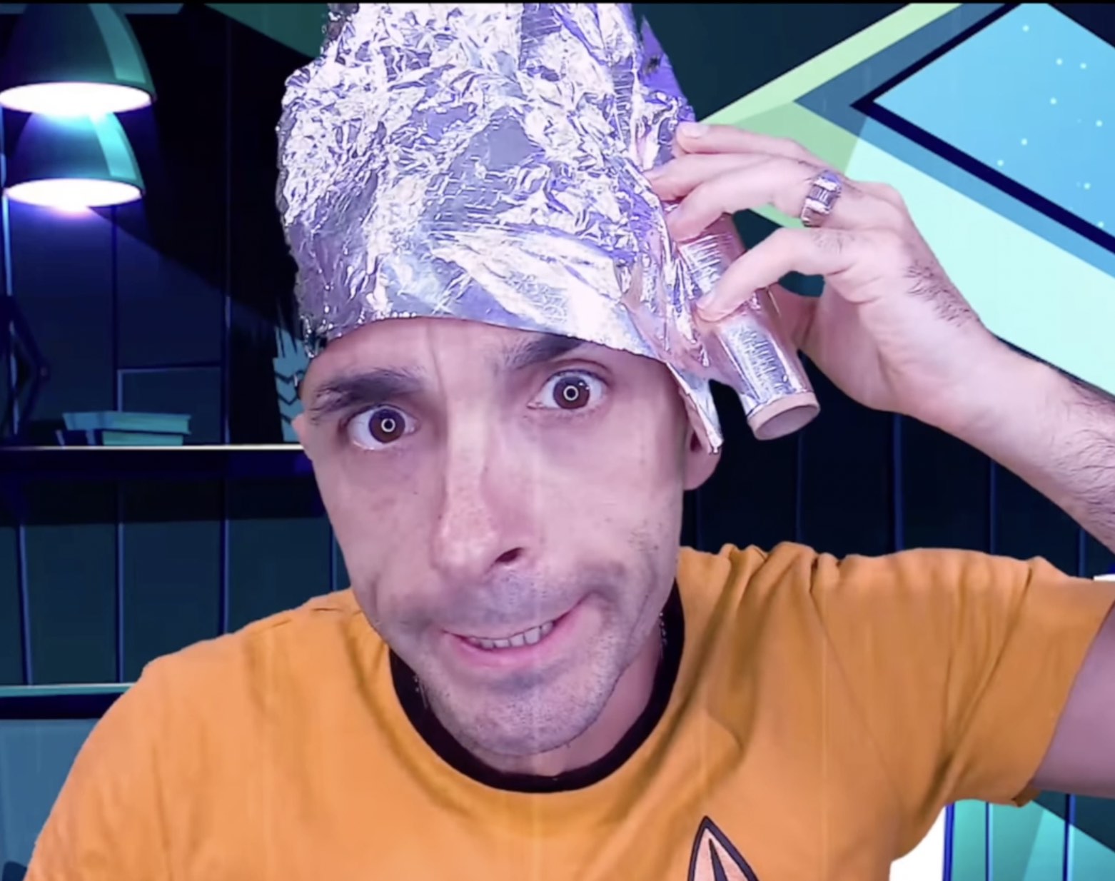 Paul Hibbert wearing a Foil Hat (Best Spying Prevention Equipment)