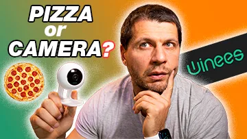 Kiril Peyanski holding a Winees Mini Camera and a pizza r camera? label aside