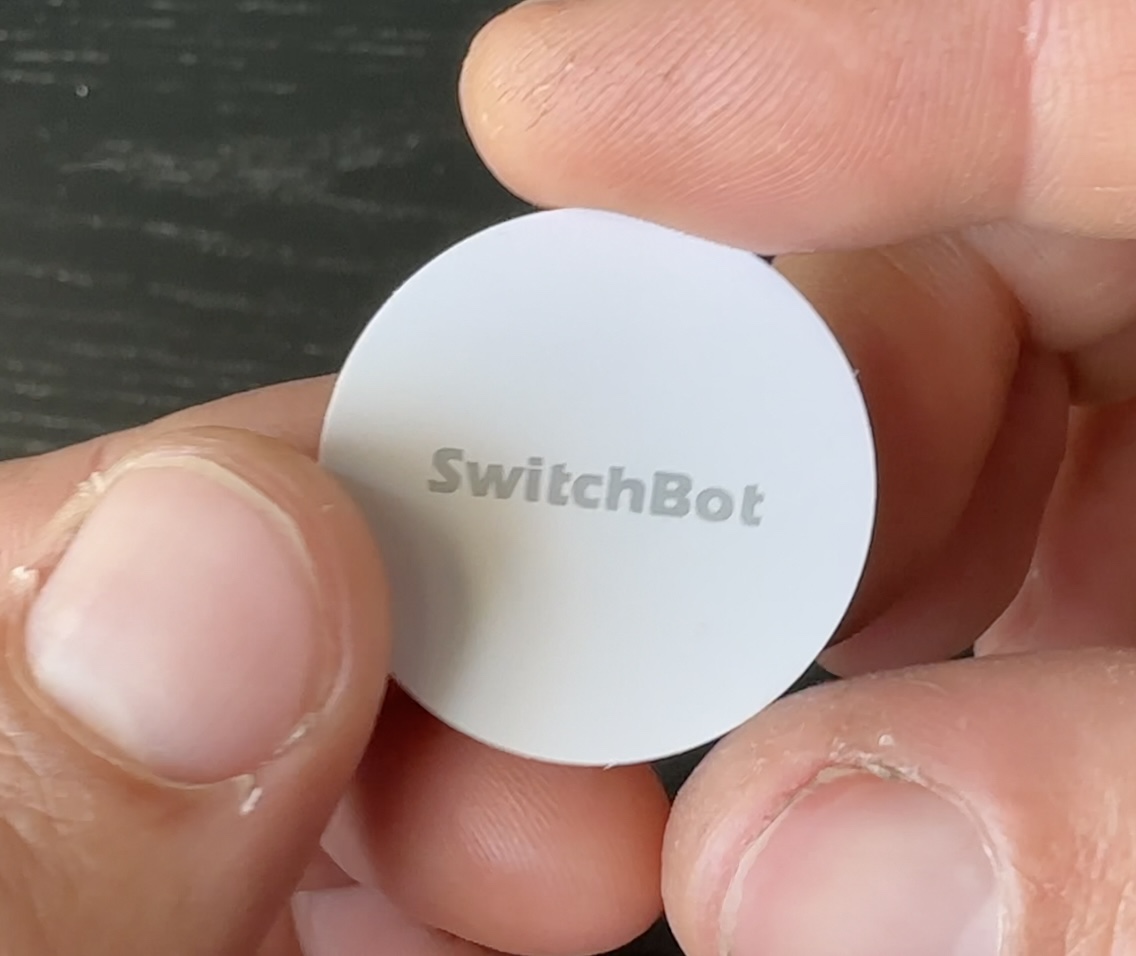 SwitchBot NFC Tag can be easily programmed to open or close the blind tilts when scanned with a phone