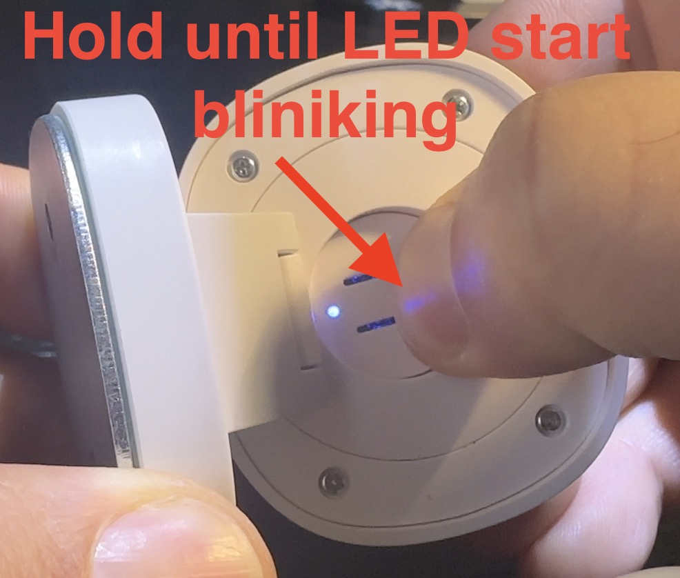 Hold the reset button until the LED start blinking