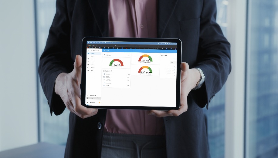 Man Holding a Tablet with Home Assistant